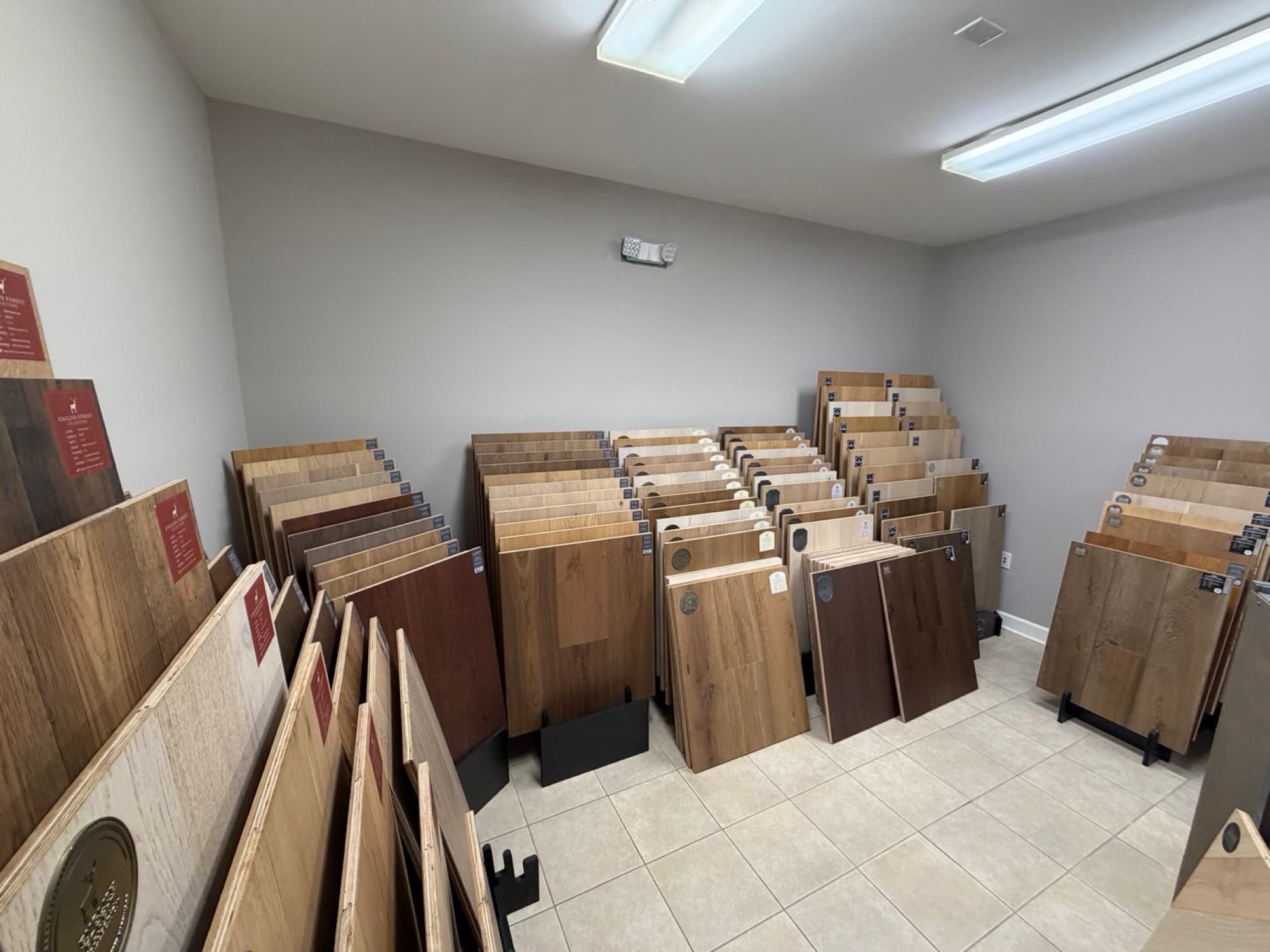 Engineered hardwood samples including English Forest Collection in the 12th And Oak showroom