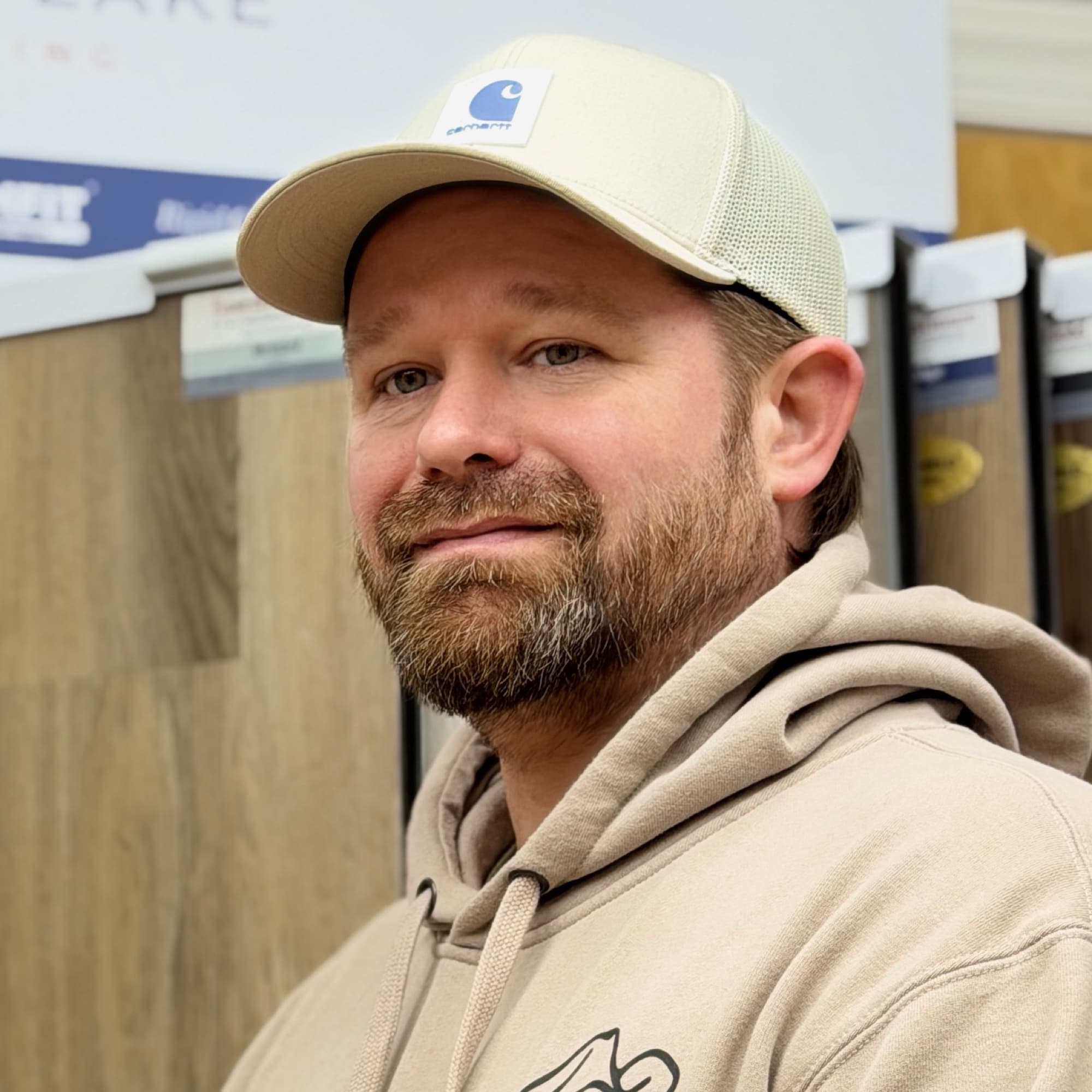 Izral Daniels, owner of 12th And Oak Floor Co., during a hardwood flooring consultation in Clayton NC