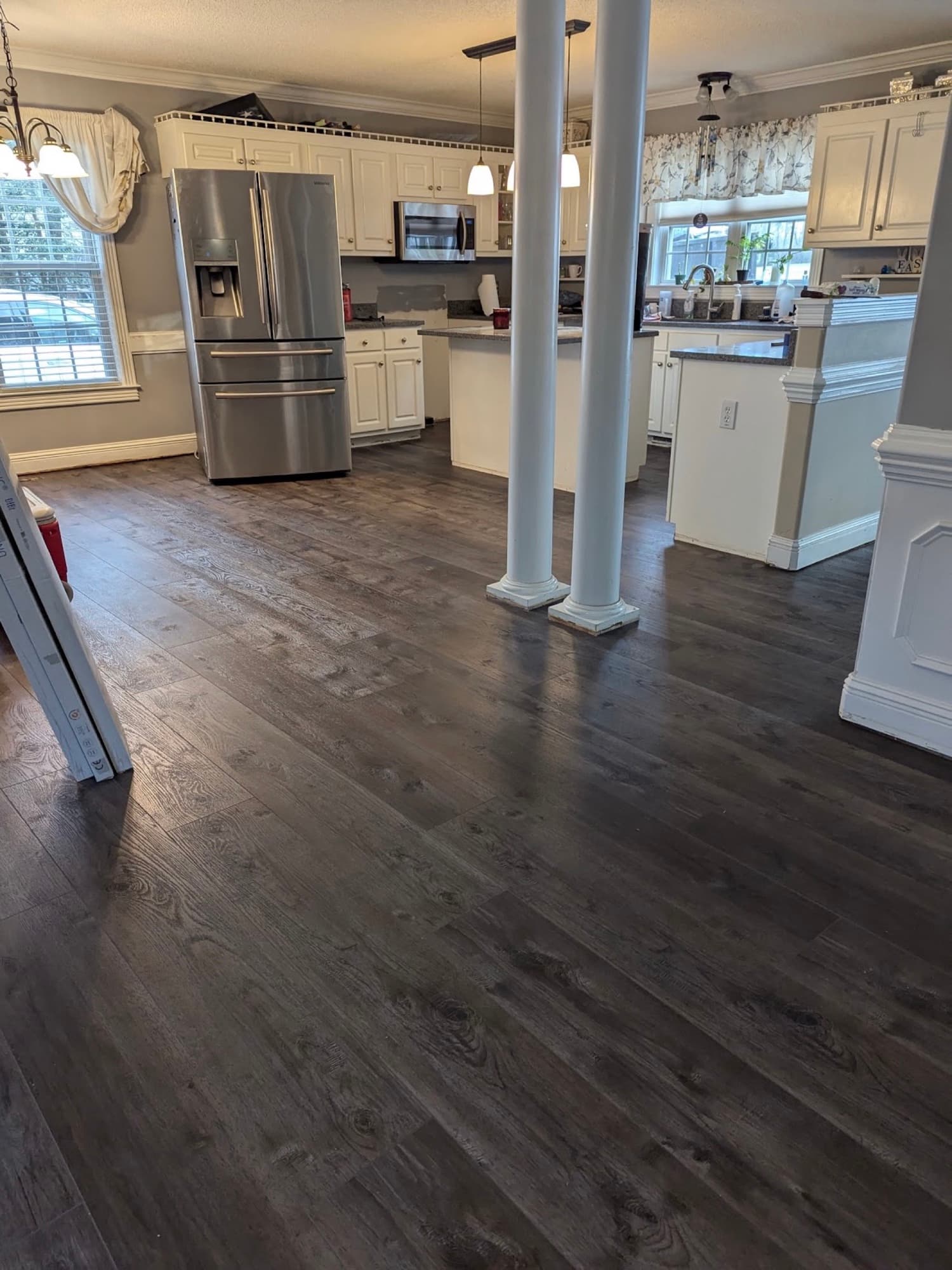 Completed LVP installation in Winston Plantation Clayton NC, Innova SPC Pearl River continuous through main living areas after full demo and moisture barrier